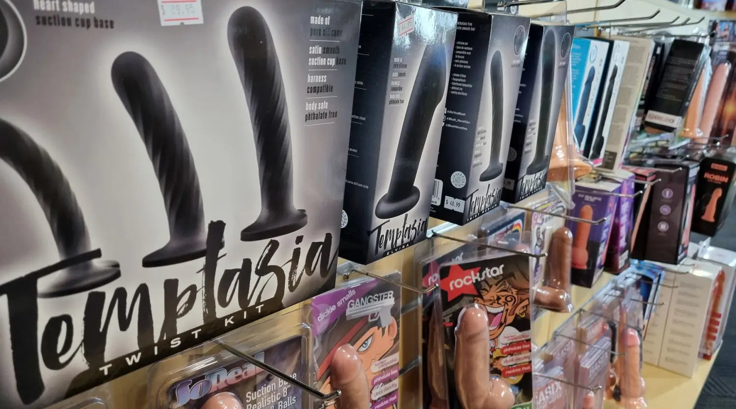 image of dildo used for pegging in adult shop store